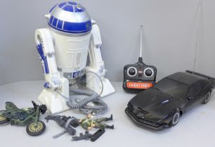 An R2D2 telephone, a Night Rider remote control car and a soldier figure with motorbike