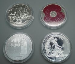 A 2007 silver Britannia £2 coin, a 2014 silver Jersey D-Day £5 coin, a 2014 WWI Centenary £5 coin