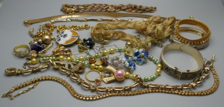 A collection of gold tone jewellery