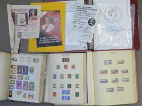 Four albums of British and worldwide stamps