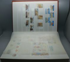 Stamps; an album of stamps including sheets, Guernsey Rupert and Friends, Malta birds, Birds of
