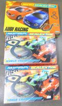 Three Micro Scalextric sets; Audi Racing and two World Championship sets