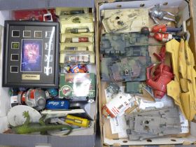 A collection of die-cast model vehicles, plastic model tanks, Star Wars film cell display, etc., two