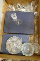 A large collection of glassware including coloured, lead crystal, punch bowl set, drinking