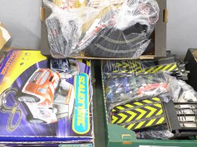 A Scalextric Mini Car Racing Set, a large amount of track and fencing, extra cars, spares, lap