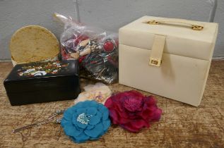 A collection of costume necklaces and bracelets, two jewellery boxes and hair pieces