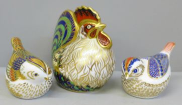 Three Royal Crown Derby paperweights, Farmyard Cockerel, Firecrest and Goldcrest, all boxed