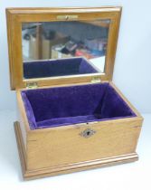 An Edward VII mahogany inlaid jewellery casket with mirror to lid