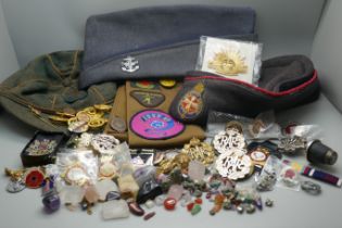 A collection of military badges, other badges and patches, three hats, BB, Girls Brigade and Scouts,