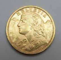 A Swiss .900 gold 20 Franc coin, 1906