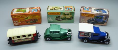 Three vintage Matchbox 75 cars in original boxes; a 44 Passenger Coach, a 73 Model 'A' Ford and a 38