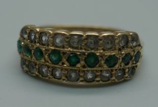 A 9ct gold, three row emerald and white stone ring, 3.7g, R
