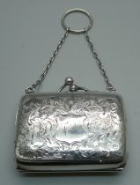 A small hand engraved silver purse, Birmingham 1911, interior a/f