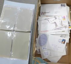 Approximately 150 first day covers and an empty stamp album