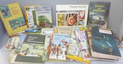 A box of Ladybird books and other educational books