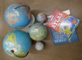 Five globes, various sizes and two atlases