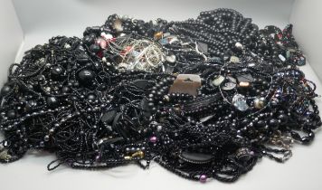 A collection of costume necklaces including vintage