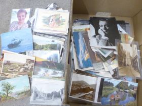 A collection of 250 postcards, vintage to modern