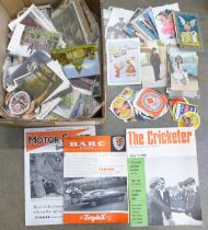 A collection of ephemera including 150 postcards, beer labels, postcard sleeves