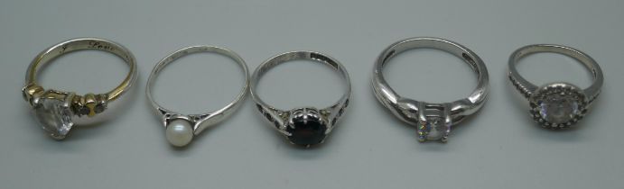 Five silver rings