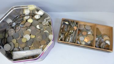 Two tins of British and foreign coins