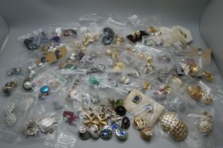 Seventy-five pairs of clip-on earrings