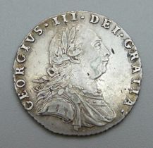 A 1787 George III sixpence