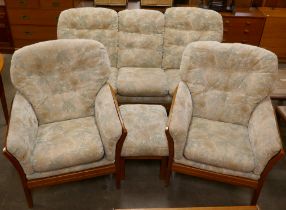 A Cintique teak and fabric four piece lounge suite