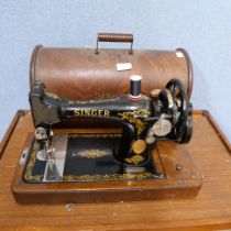 A cased Singer sewing machine