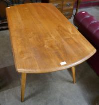 An Ercol Blonde elm and beech Windsor drop-leaf table