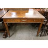 A 19th Century French walnut bureau plat