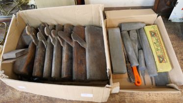 A collection of moulding planes, sharpening stones and files