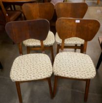 A set of four Remploy butterfly back chairs