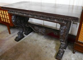 A Venetian Rococo Revival carved walnut table