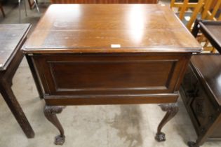 An Edward VII Asprey metamorphic mahogany surprise cocktail cabinet