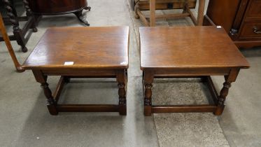 A pair of oak lamp tables