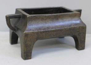 A Ming style bronze incense burner, 17.5cm width with handles