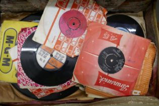 A case of 78rpm records and 7" singles, with damp penetration **PLEASE NOTE THIS LOT IS NOT ELIGIBLE