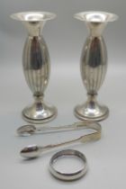 A pair of silver vases, a pair of Victorian silver sugar bows and a silver napkin ring, 114g