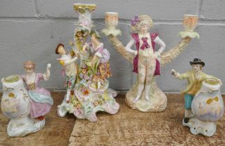 Four German porcelain figural candle holders