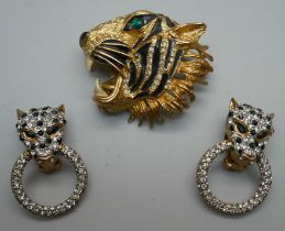 A pair of Butler & Wilson clip-on leopard earrings and a tiger brooch