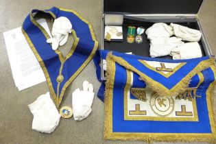A briefcase with Masonic apron and gloves, a box of Masonic Trust medallions (Nottinghamshire)