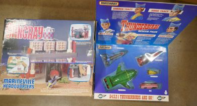 A Matchbox Stingray Marineville Headquarters and a Matchbox Thunderbirds Rescue Pack