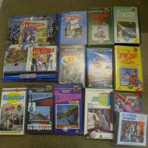 A collection of Gerry Anderson mechandise including Thunderbirds, Captain Scarlet, Stingray, etc.