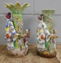 Two figural candle holders