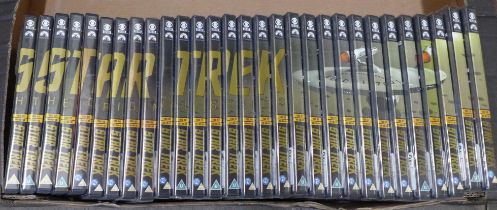 A full set of 28 Star Trek DVDs (The Original Series), 22 DVDs still unopened in original cellophane