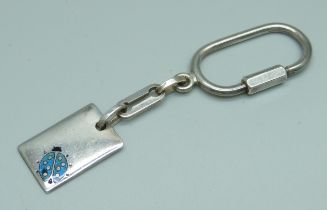 A silver and enamel key ring