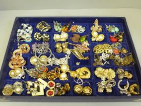 Over 60 pairs of costume earrings