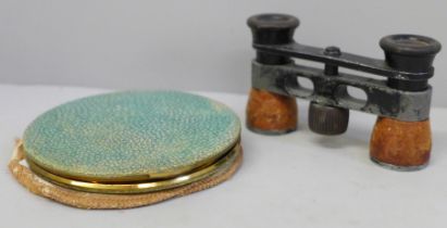A pair of opera glasses and a shagreen covered compact