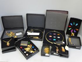 A large boxed collection of Joan Rivers costume jewellery, a boxed ten colour interchangeable bee